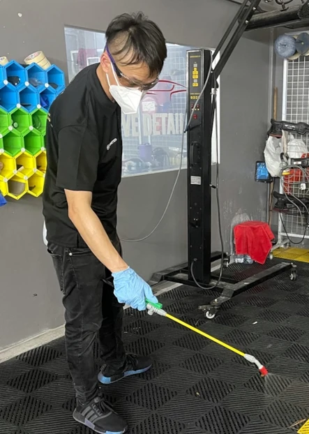 Kirby Poh's cleaning services client rendering disinfection service