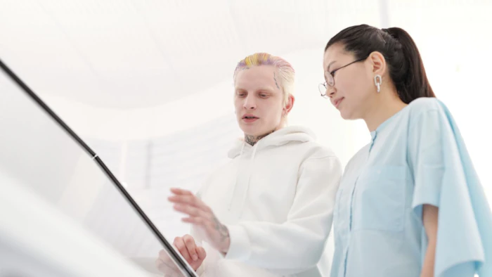 Store assistant interacting with patron