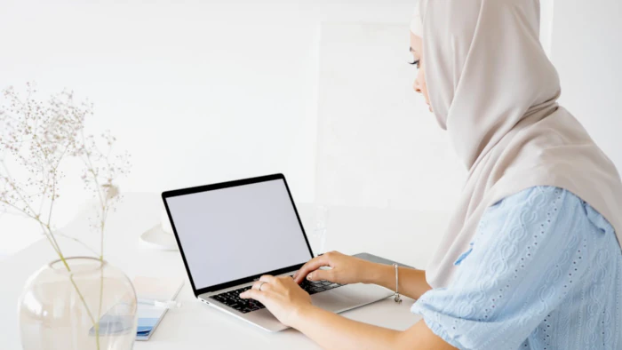 Writer working on a laptop